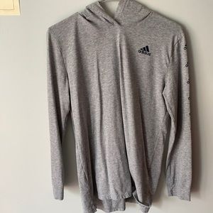 Grey shirt with adidas logos on side and hood